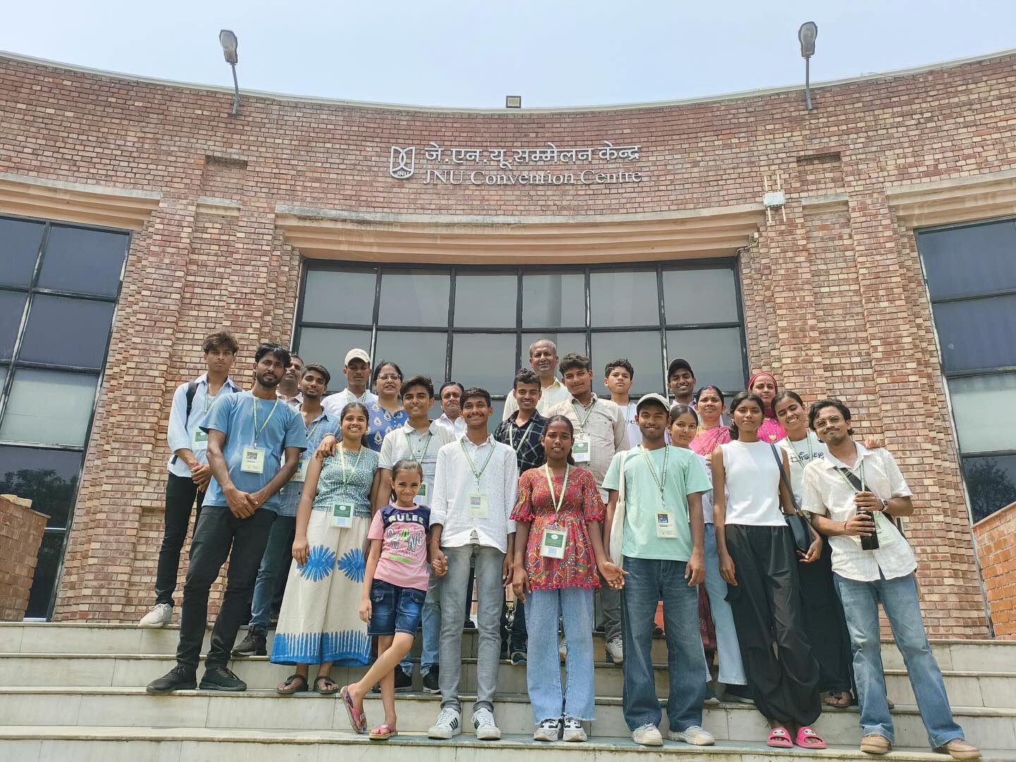 Community members working together in organic farming demonstration at eco-campus
