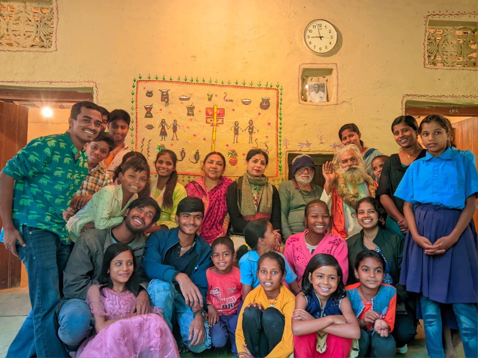Behind-the-scenes photo of Aājoor film production with director and child actors